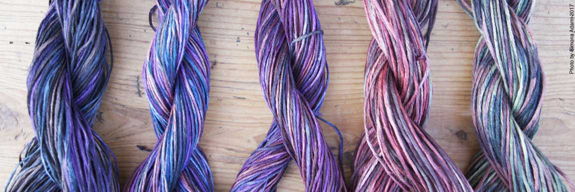 fili di lino tinti in gradazione di colori